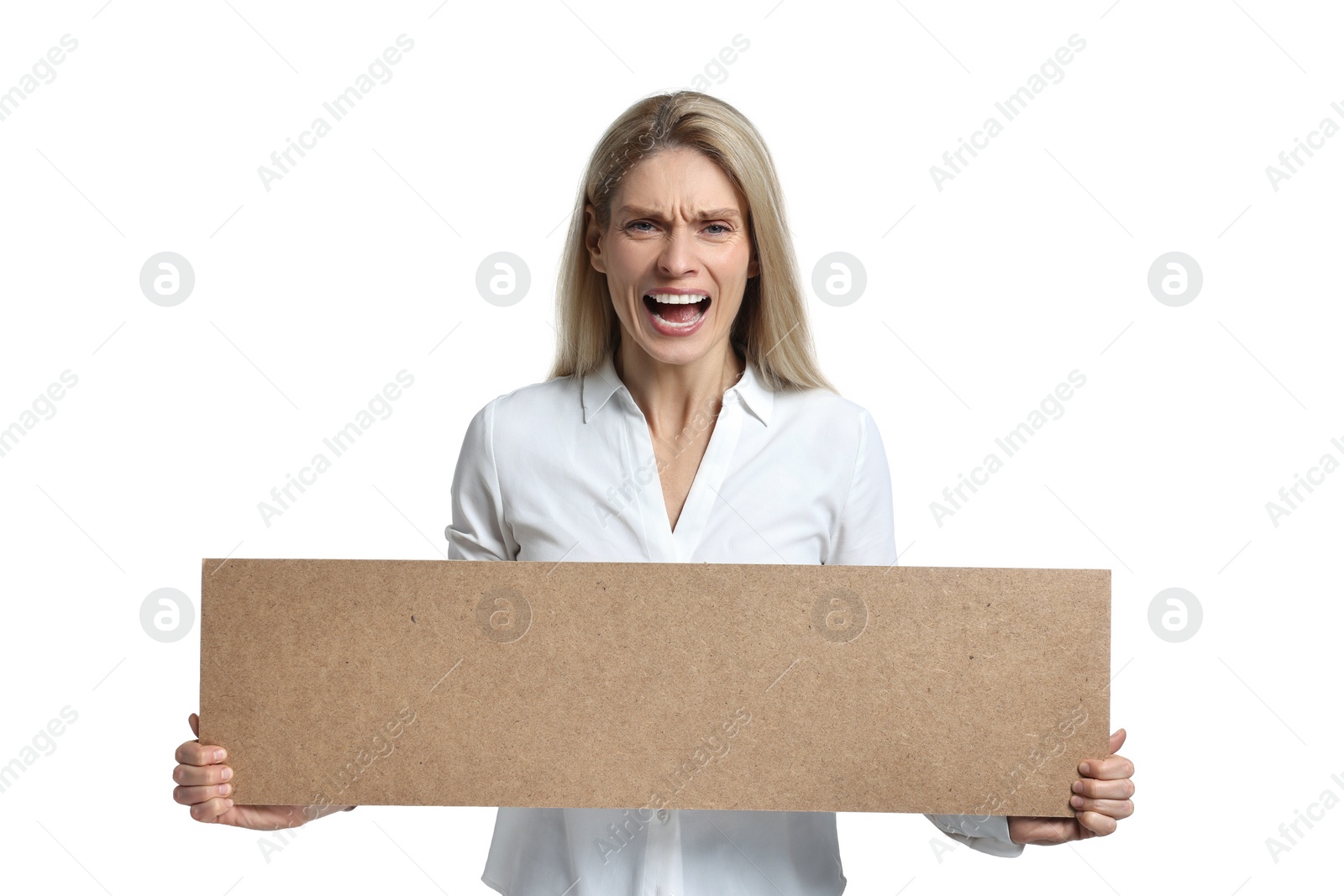 Photo of Angry woman holding blank cardboard banner on white background, space for text