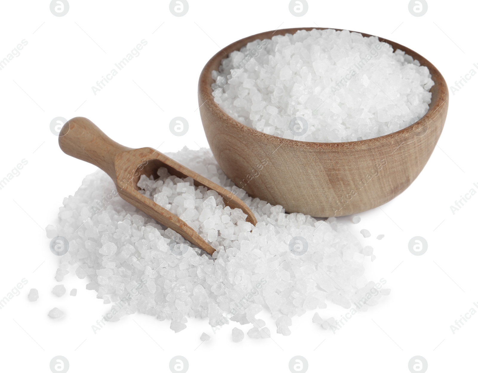 Photo of Natural sea salt, wooden bowl and scoop on white background