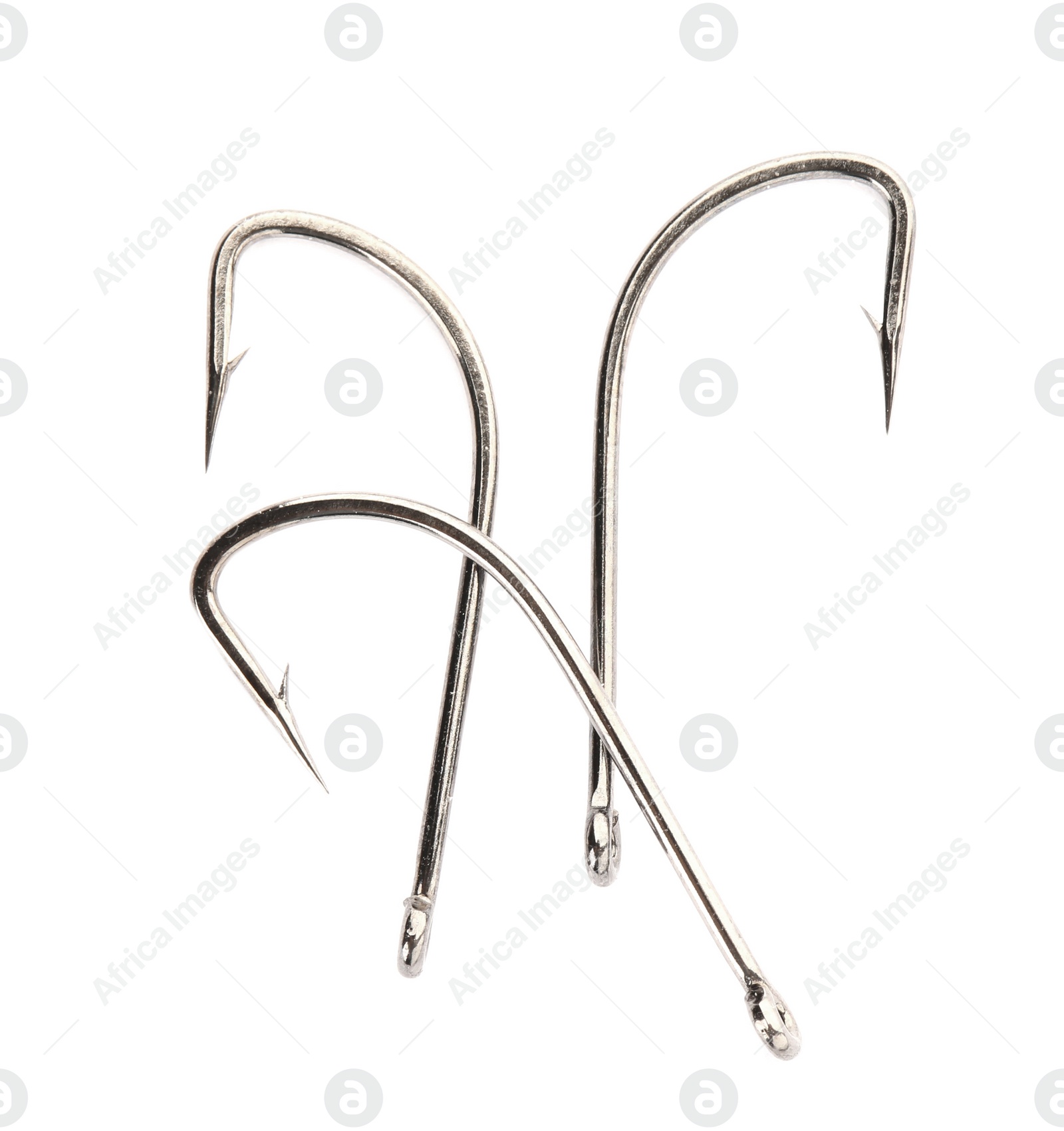 Photo of Metal hooks on white background. Fishing accessories