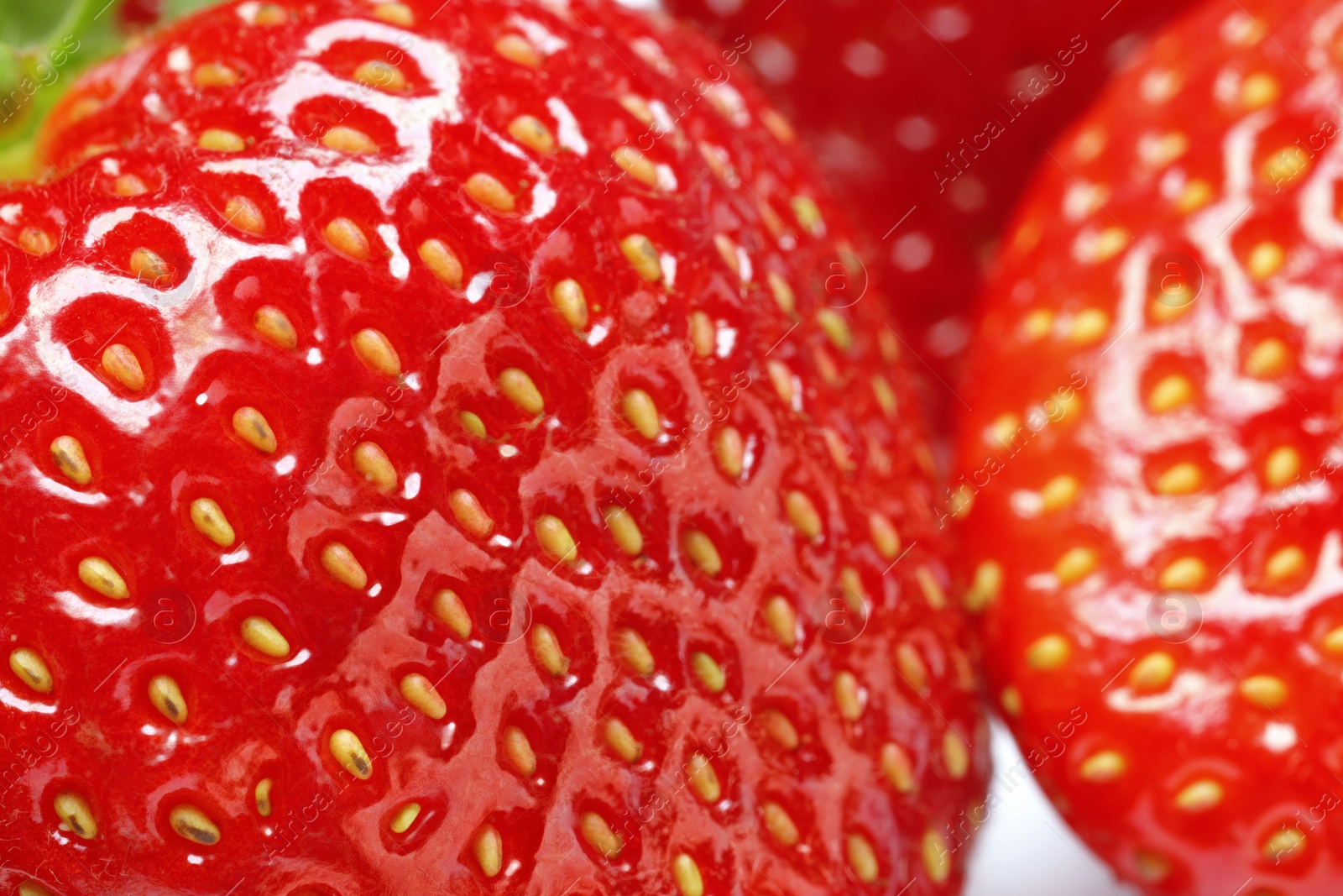 Photo of Tasty fresh ripe strawberries as background, macro view. Fresh berries