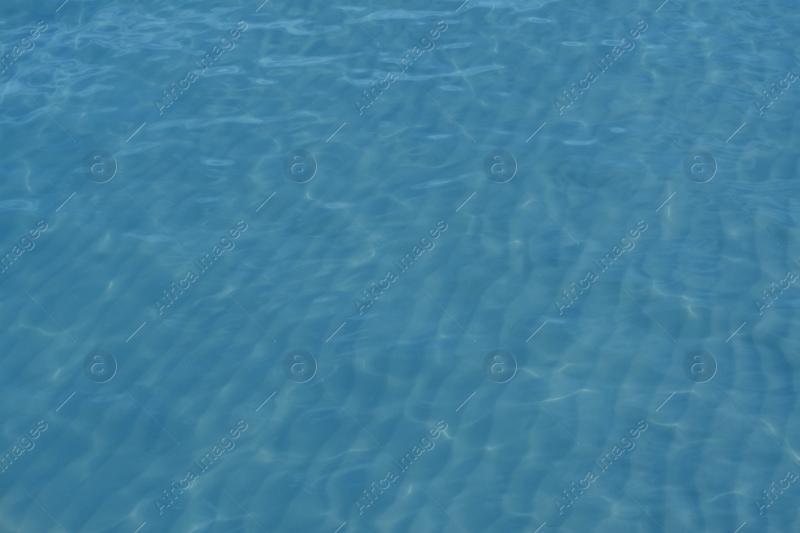 Photo of Beautiful sea water surface with ripples as background