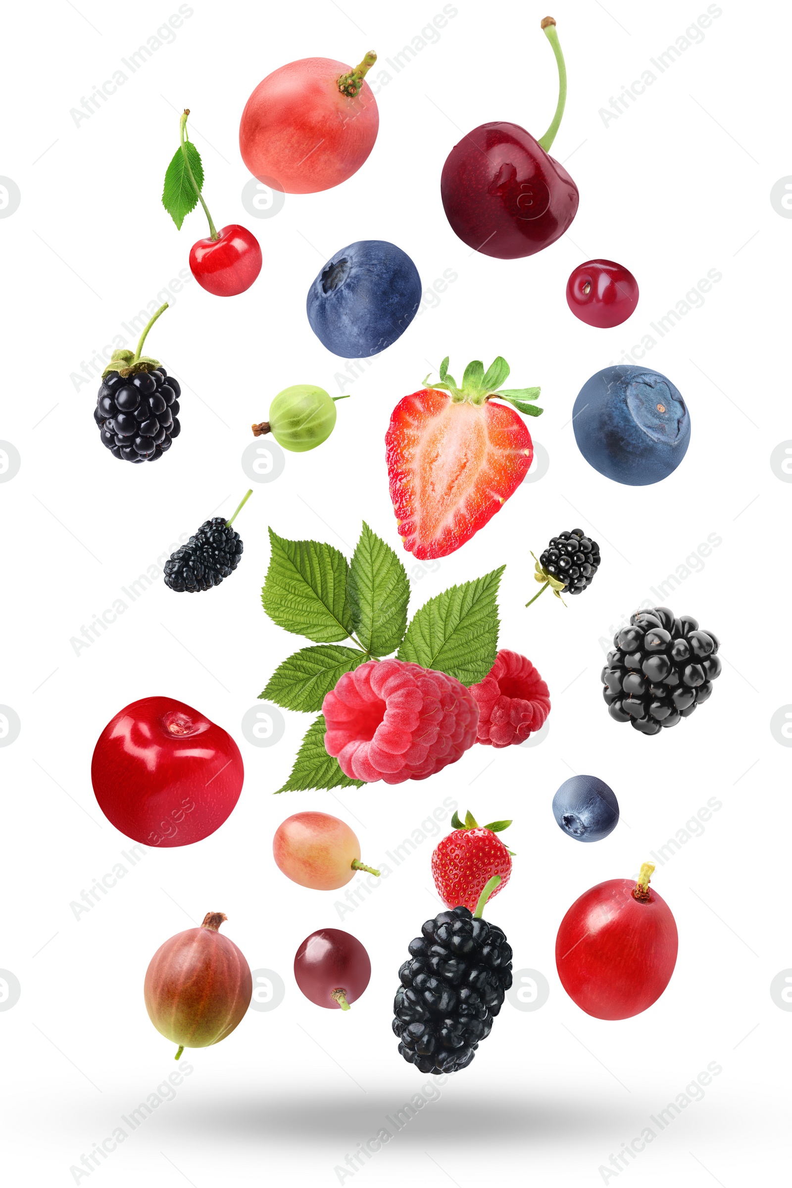 Image of Many different fresh berries falling on white background