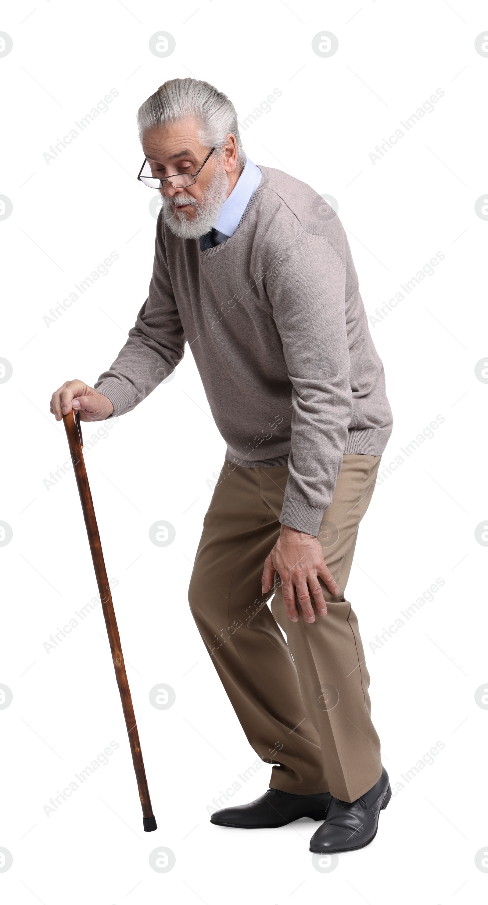 Photo of Tired senior man with walking cane on white background