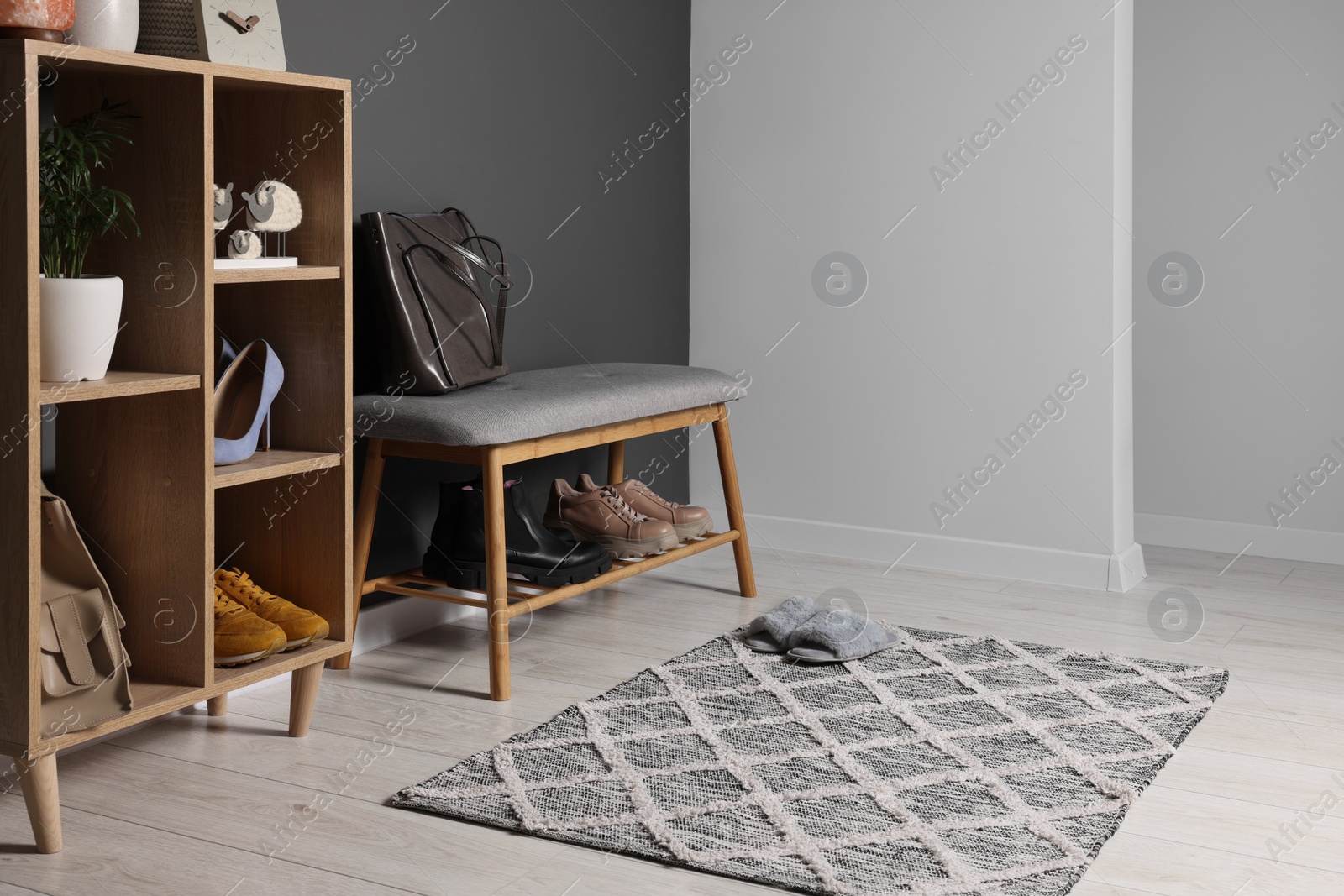 Photo of Modern hallway interior with stylish furniture and decorative elements