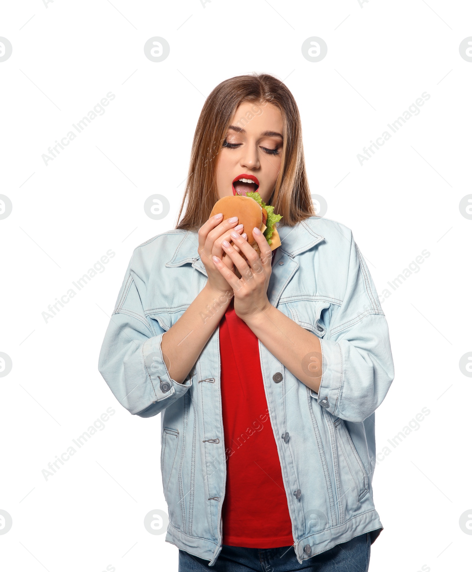 Photo of Pretty woman eating tasty burger isolated on white