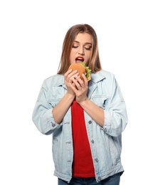 Photo of Pretty woman eating tasty burger isolated on white