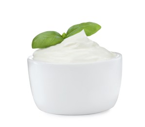 Photo of Delicious sour cream with basil in bowl on white background