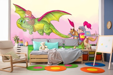 Image of Kid's room interior with comfortable bed and other furniture. Fairytale themed wallpapers with dragon, knight and princess
