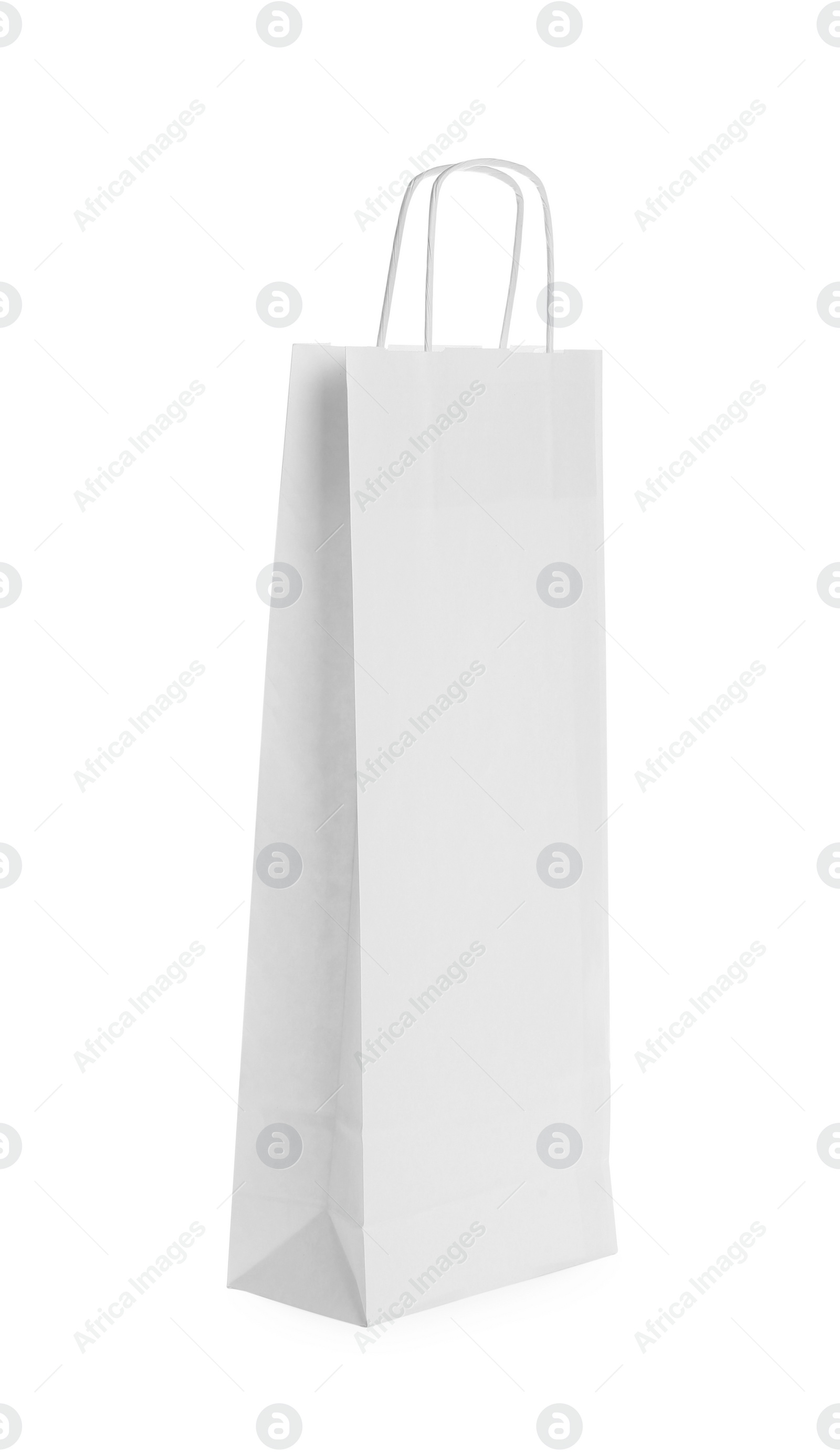 Photo of Blank paper bag isolated on white. Mockup for design