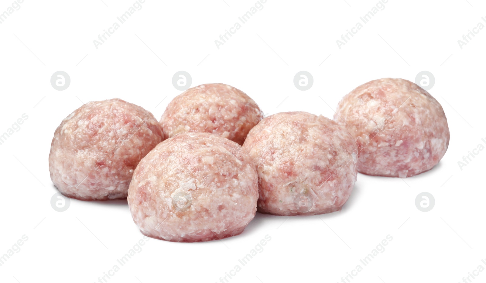 Photo of Many fresh raw meatballs on white background