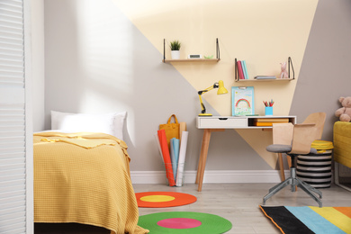 Stylish child room interior with modern furniture