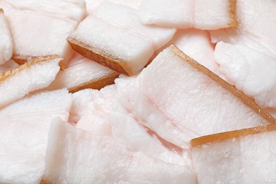 Photo of Pieces of tasty salt pork as background, closeup