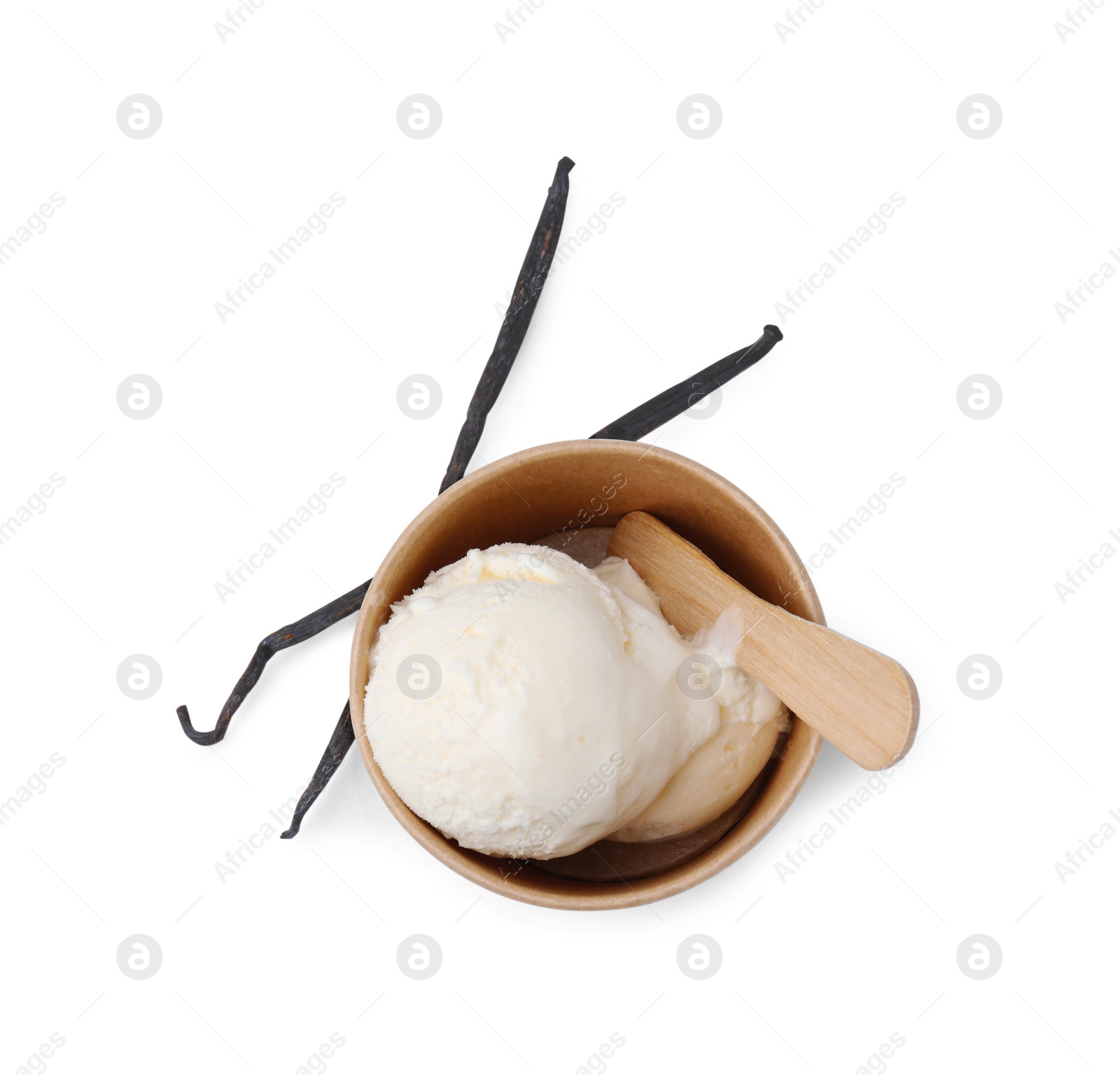 Photo of Paper cup with delicious ice cream and vanilla pods isolated on white, top view