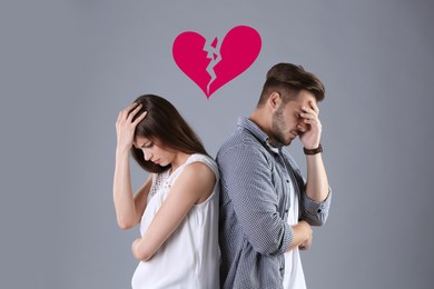 Image of Upset young couple and illustration of broken heart on grey background. Relationship problems