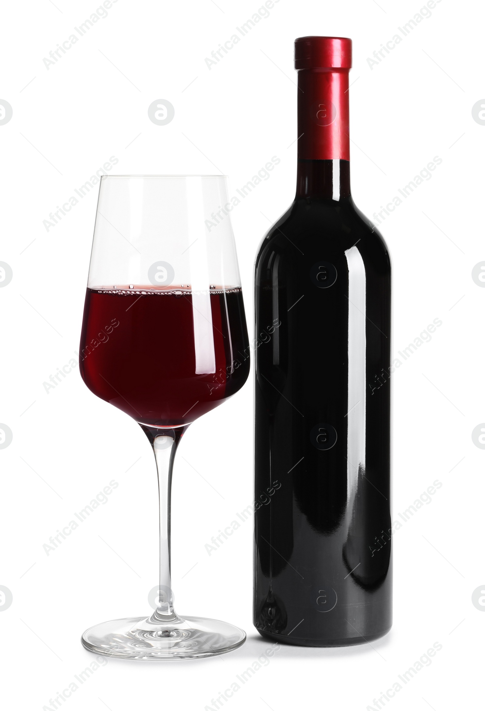 Photo of Glass and bottle of delicious red wine on white background