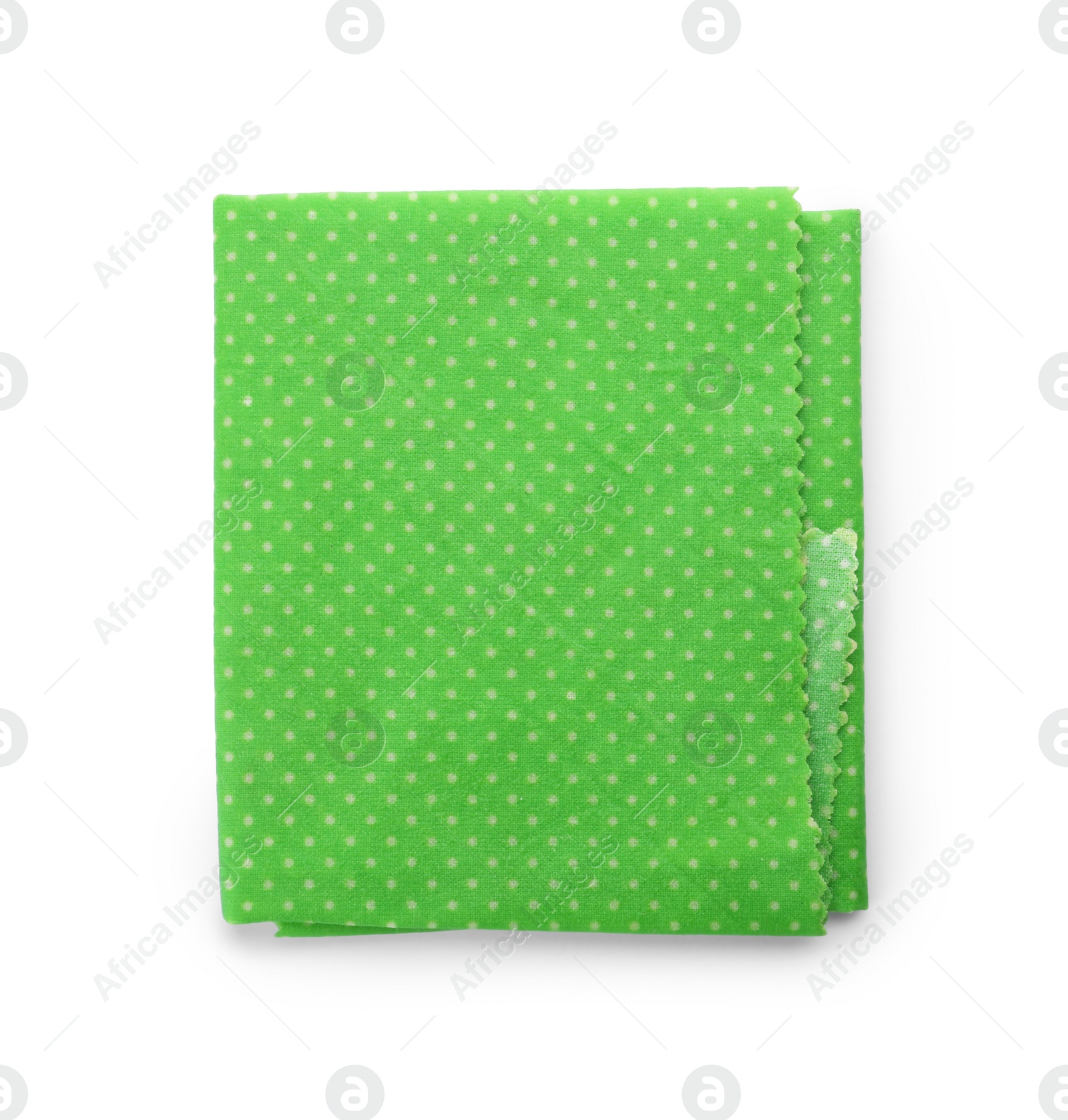 Photo of Green reusable beeswax food wrap on white background, top view