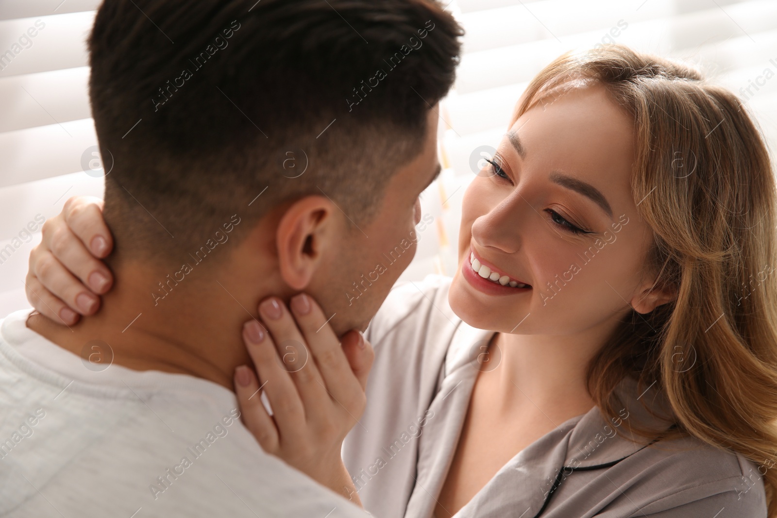 Photo of Lovely couple enjoying time together at home