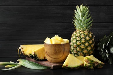 Composition with fresh sliced pineapple on table