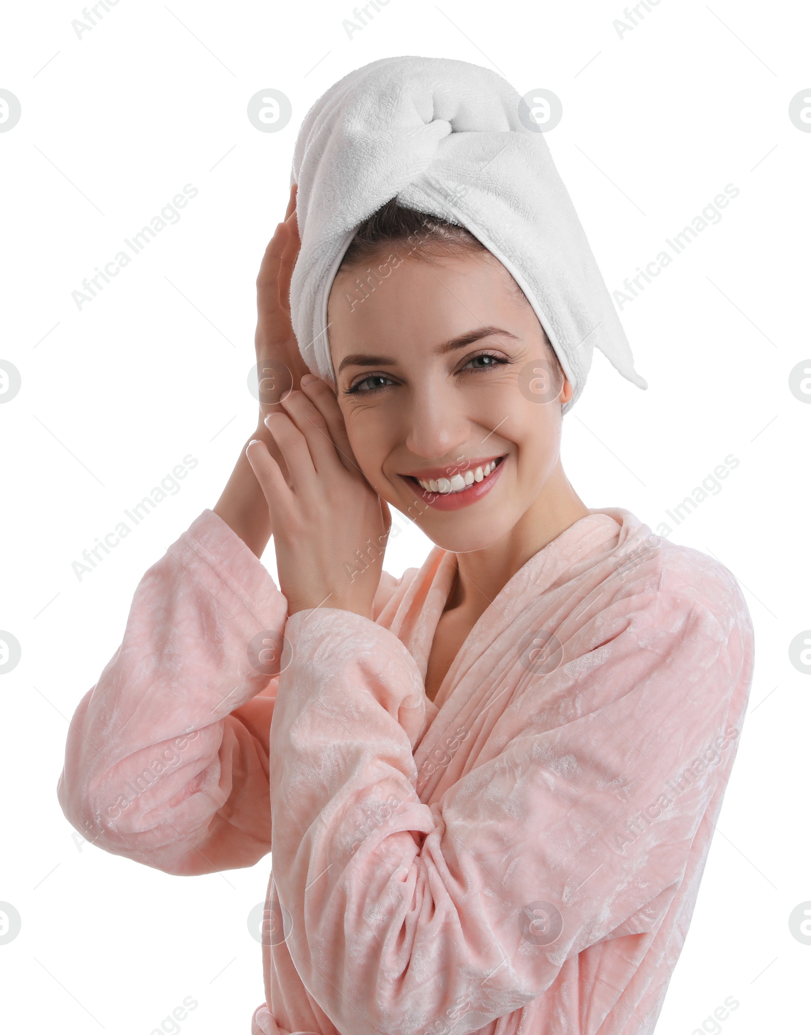 Photo of Beautiful young woman with hair wrapped in towel after washing on white background