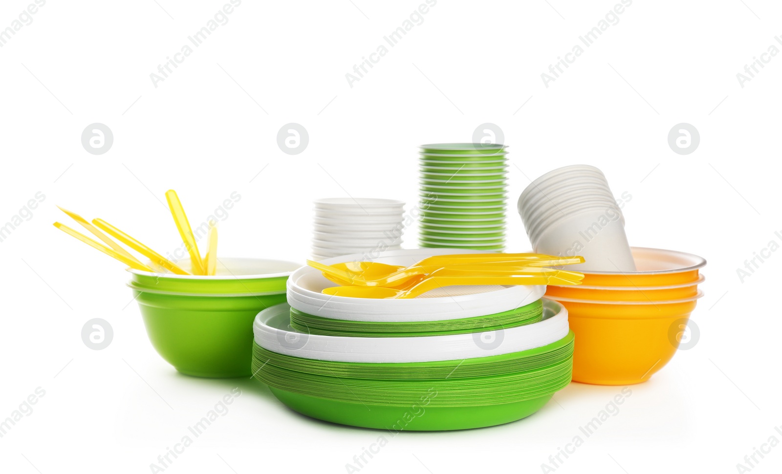 Photo of Plastic dishware isolated on white. Picnic table setting