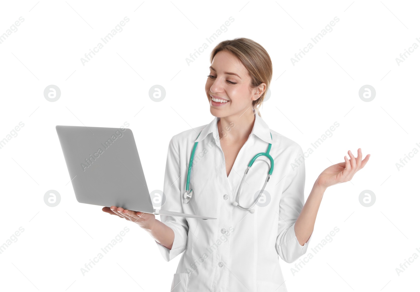 Photo of Female doctor using video chat on laptop against white background