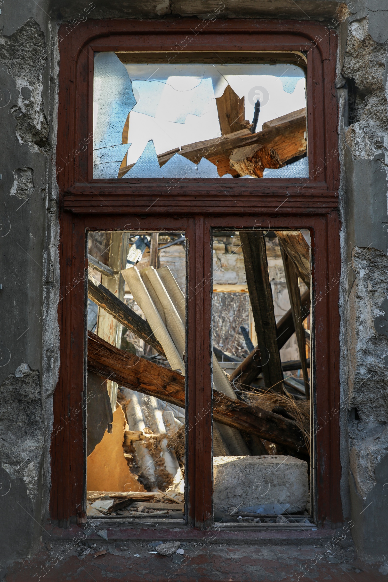 Photo of Old building with broken window after strong earthquake