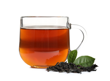 Photo of Tasty black tea with fresh and dry leaves on white background