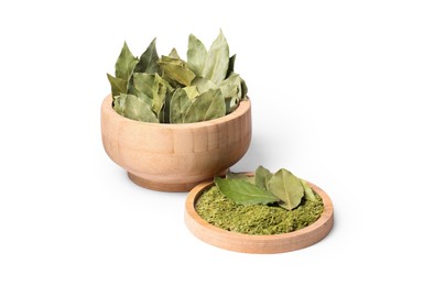 Many aromatic bay leaves on white background