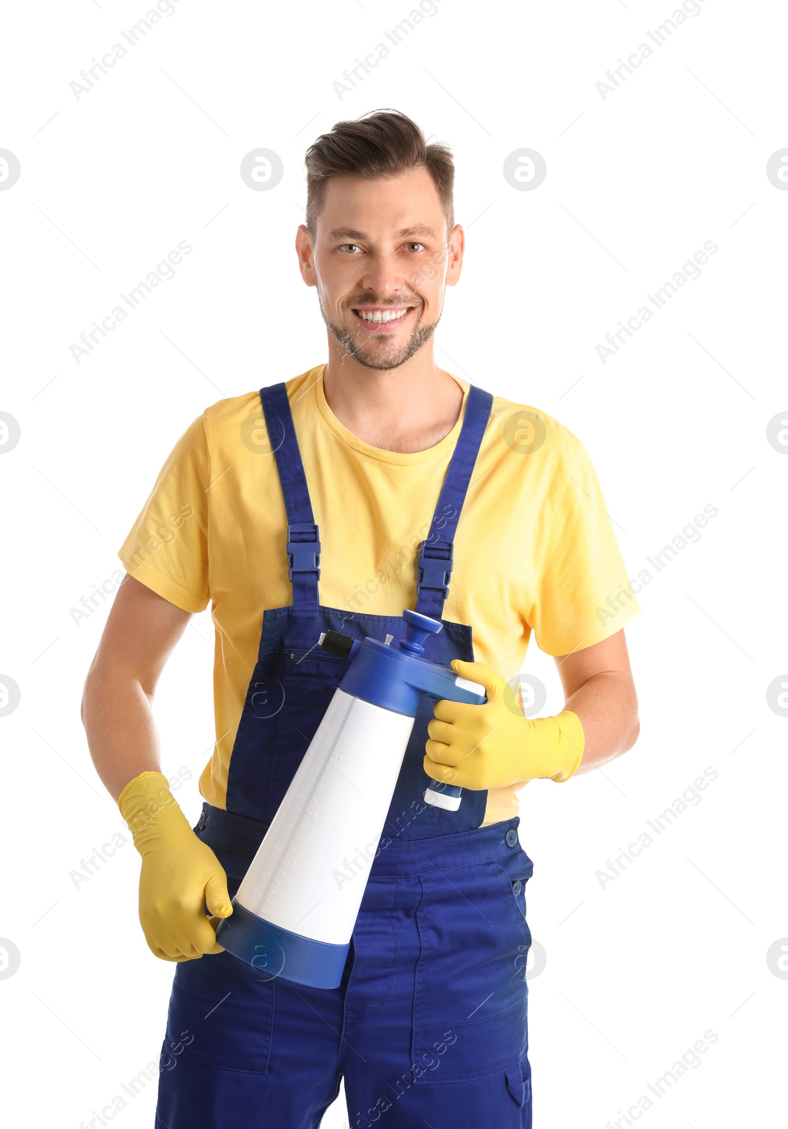 Photo of Male janitor with spray bottle of cleaning product on white background