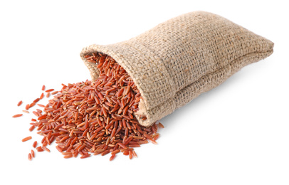 Photo of Overturned bag of brown rice isolated on white