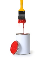 Photo of Open paint can and brush isolated on white