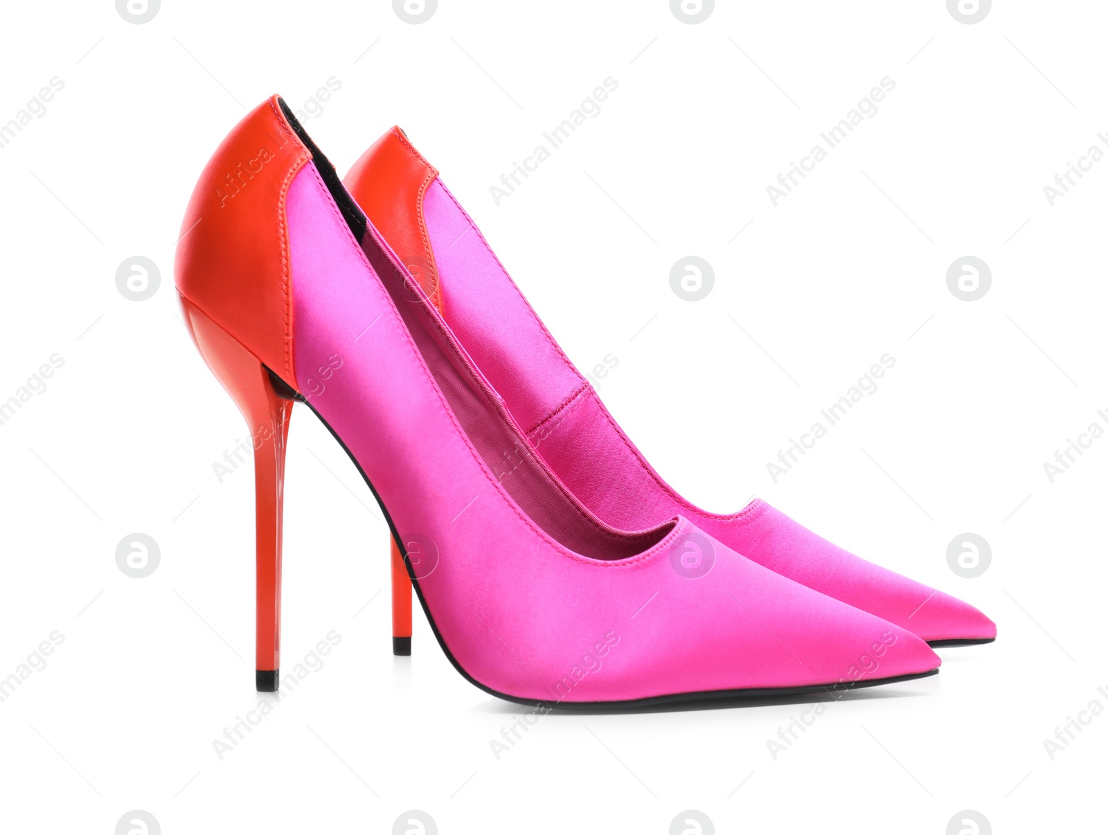 Photo of Pair of beautiful shoes on white background