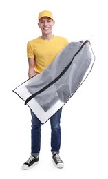 Dry-cleaning delivery. Happy courier holding garment cover with clothes on white background