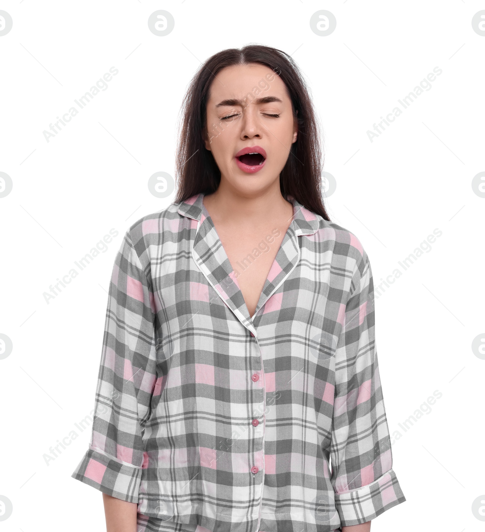 Photo of Tired young woman yawning on white background. Insomnia problem