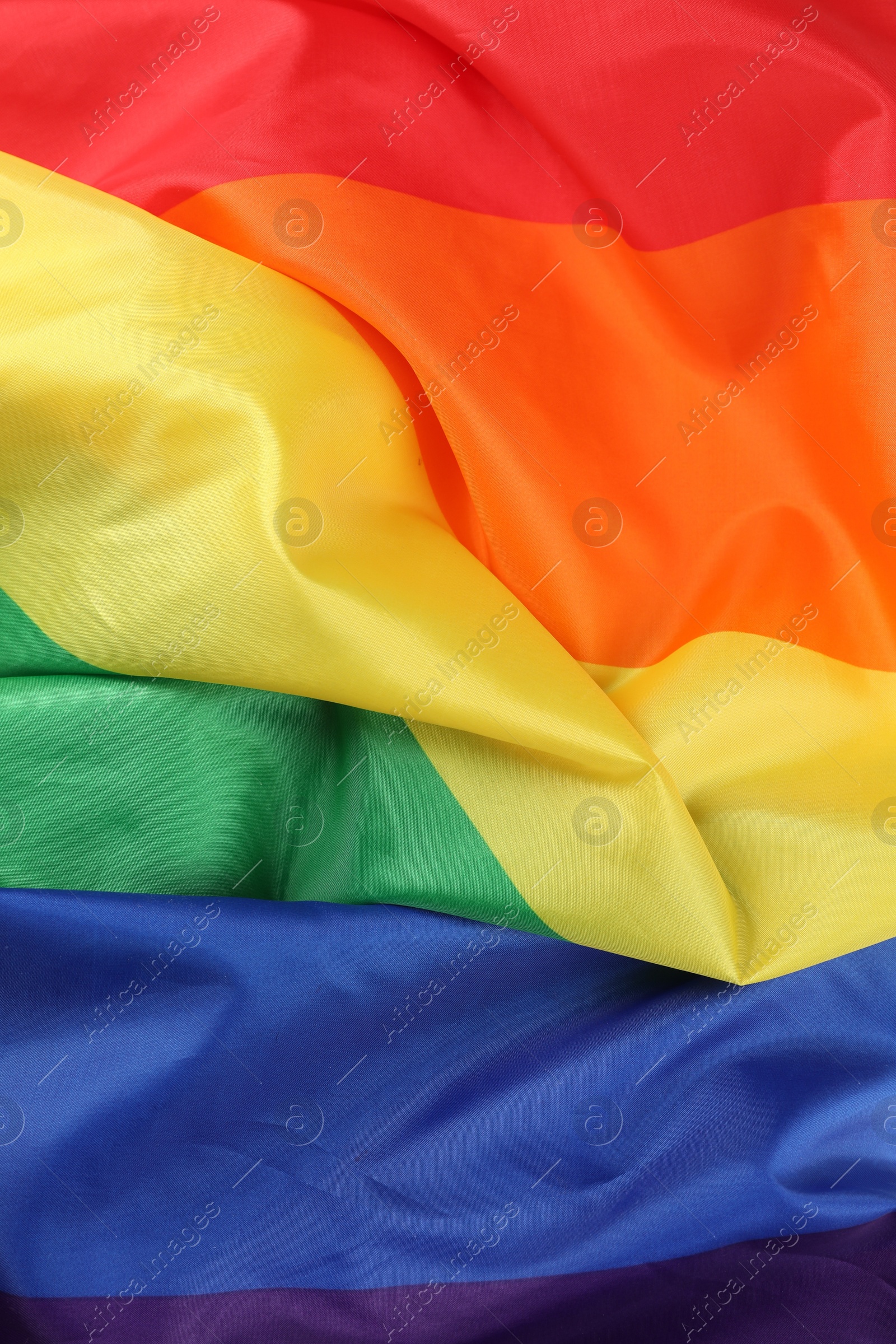 Photo of Rainbow LGBT flag as background, top view