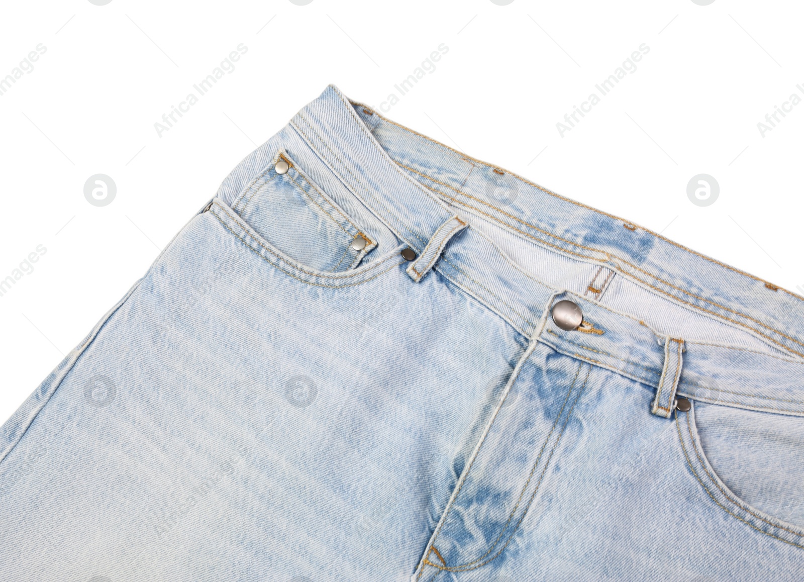 Photo of Stylish light blue jeans isolated on white, top view