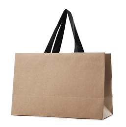 Photo of Paper shopping bag with handles on white background. Mockup for design