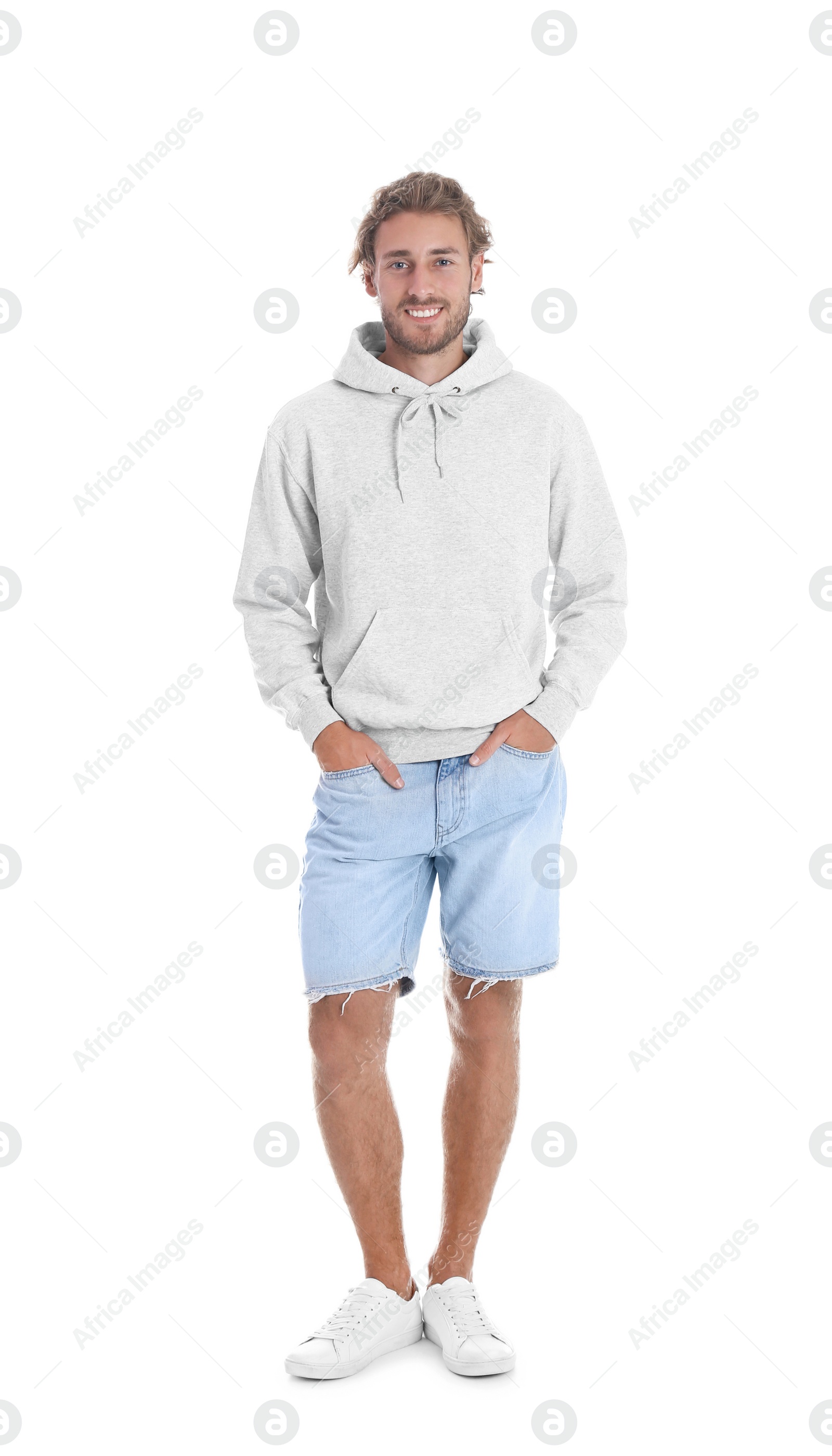 Photo of Full length portrait of man in hoodie sweater on white background. Space for design