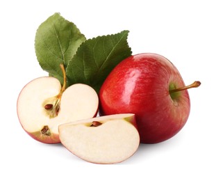 Photo of Whole, cut red apples and leaves isolated on white