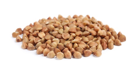 Uncooked buckwheat on white background. Healthy diet