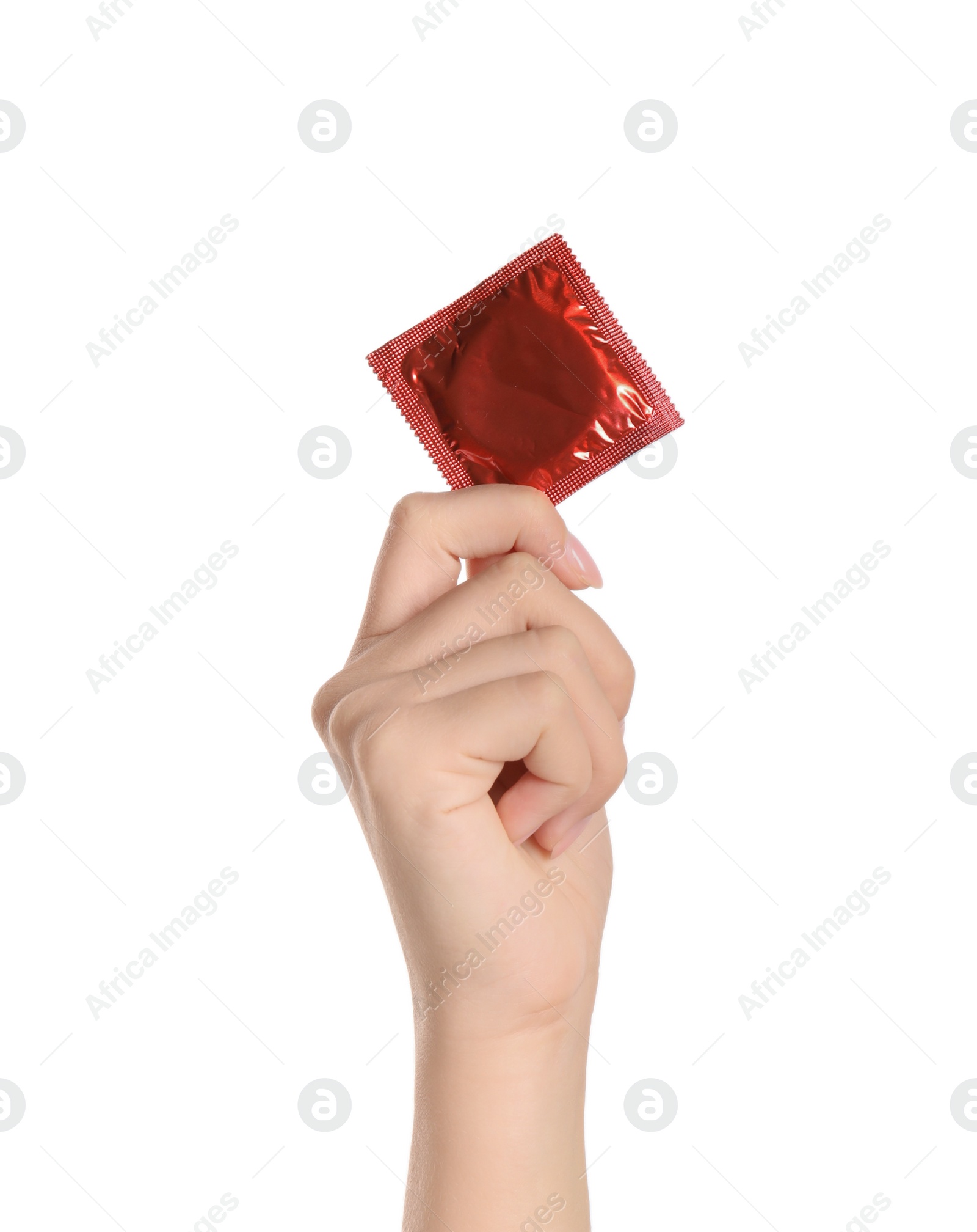 Photo of Woman holding condom on white background, closeup