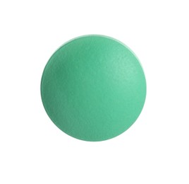 Photo of One green pill on white background. Medicinal treatment