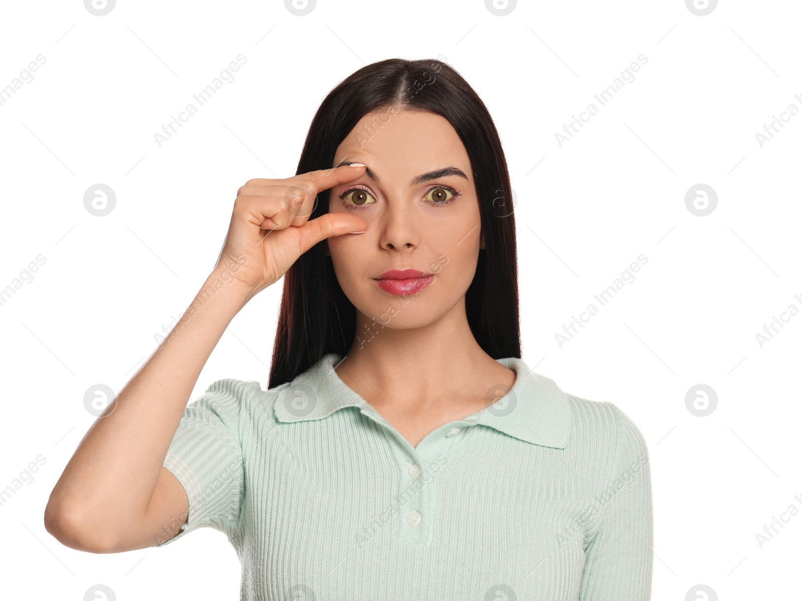 Photo of Woman checking her health condition on white background. Yellow eyes as symptom of problems with liver