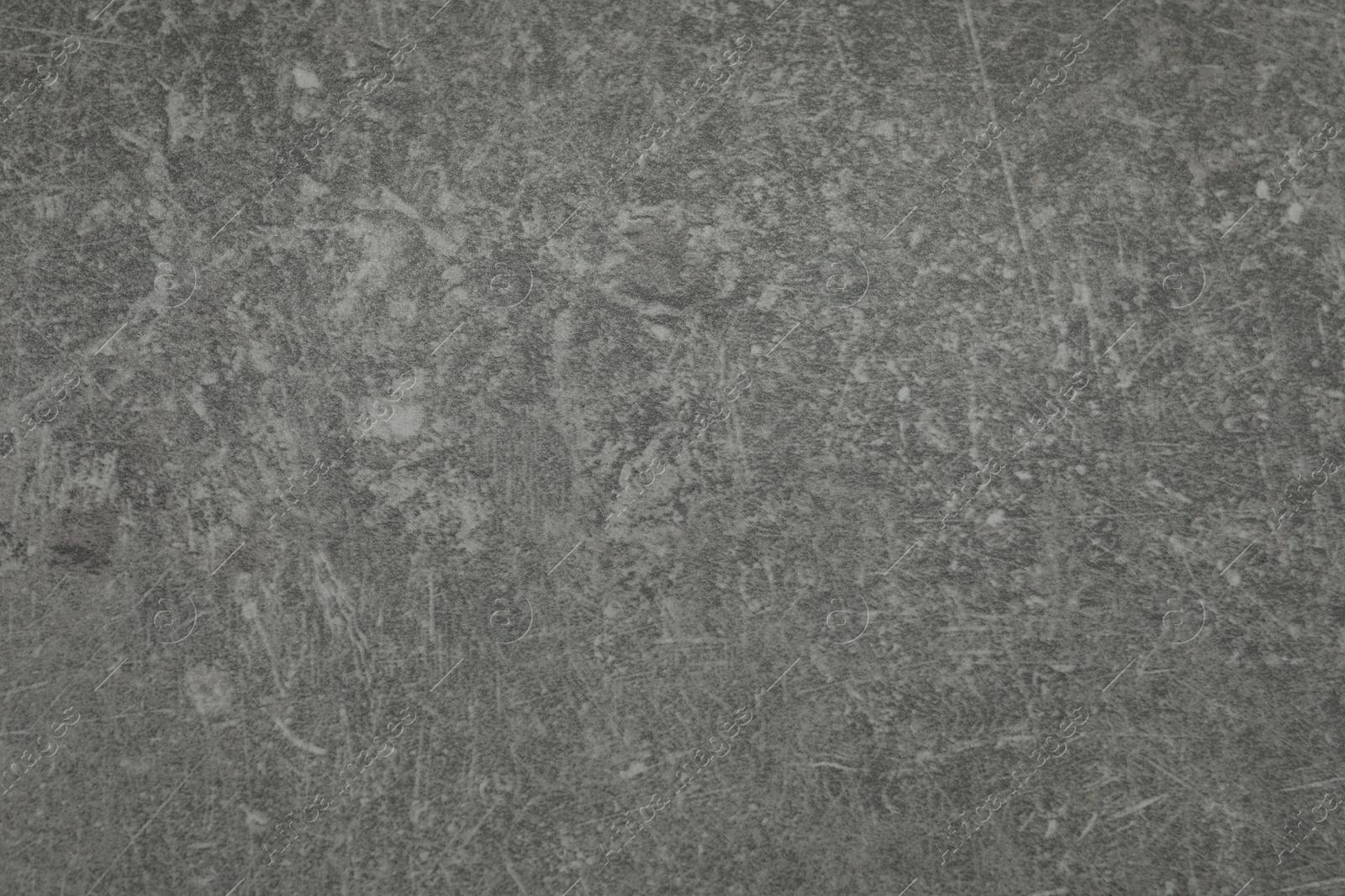 Photo of Texture of grey stone surface as background, closeup