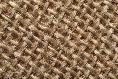 Texture of light brown fabric as background, top view