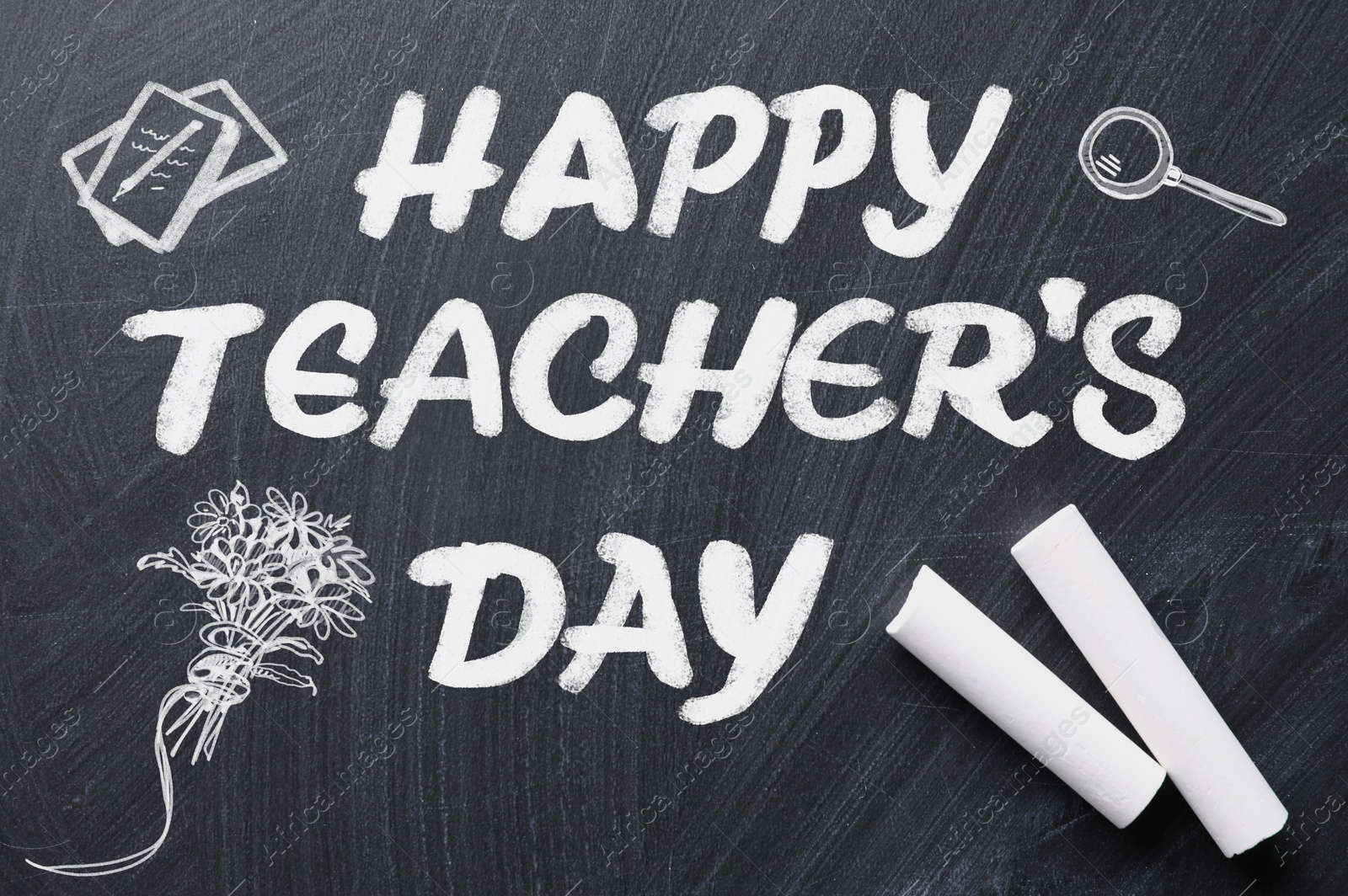 Image of Text Happy Teacher's Day with drawings and chalk on blackboard, top view. Greeting card design