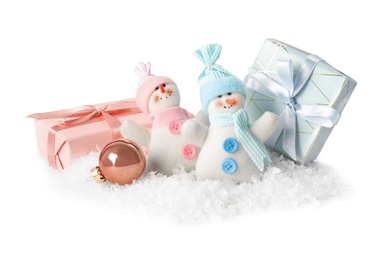 Photo of Cute snowmen and Christmas decoration on white background