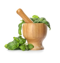 Mortar with fresh green basil leaves on white background