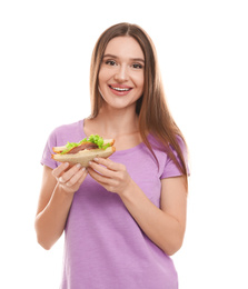 Photo of Young woman with tasty sandwich on white background