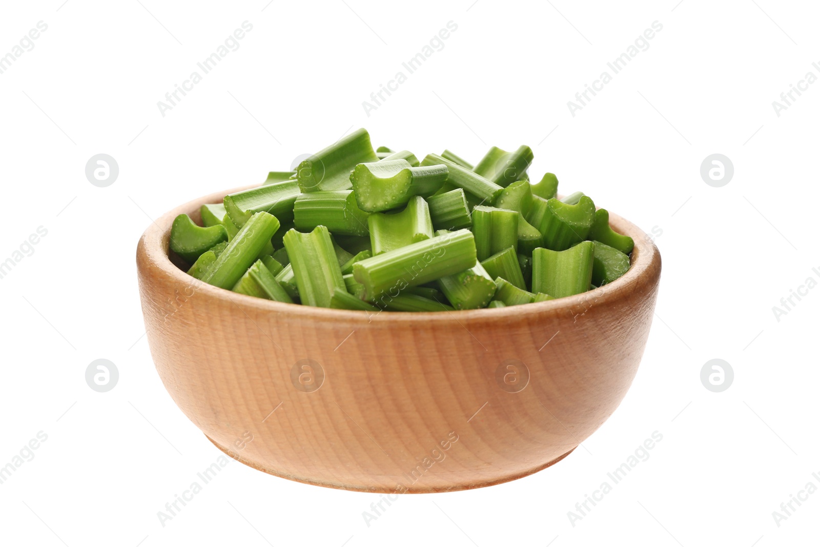 Photo of Bowl of chopped fresh green celery isolated on white